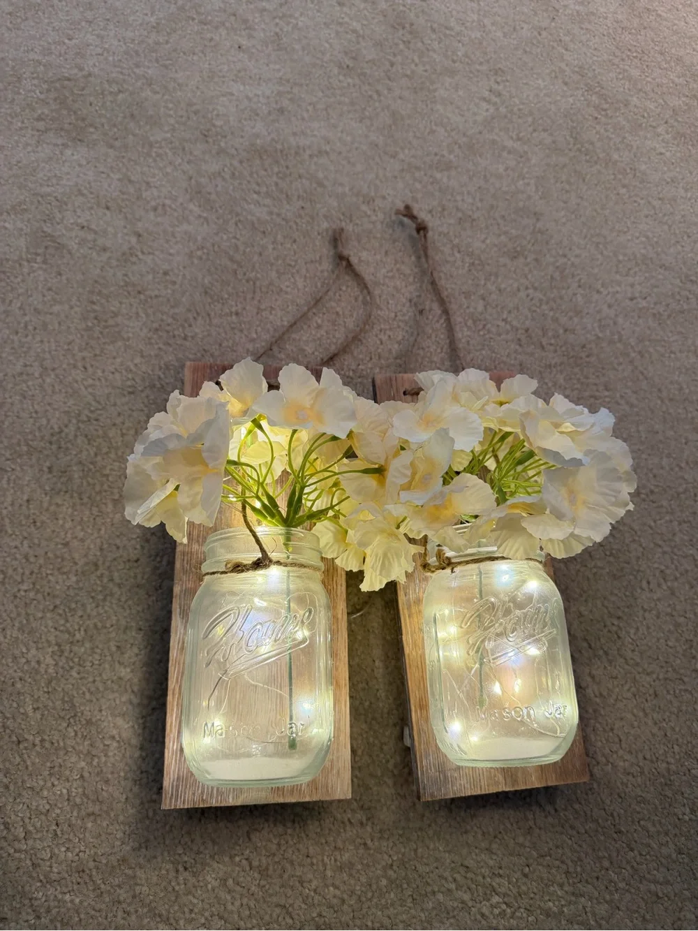 Rustic Mason Jar Wall Sconce with Cream Flowers and LED Lights - Unbranded
